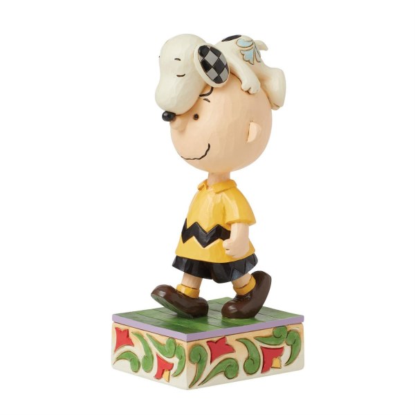 Snoopy sulla testa di Charlie Brown - Peanuts