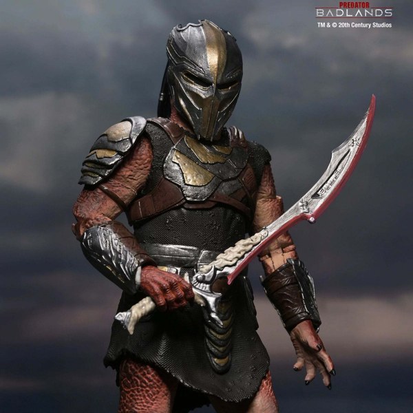 PREDATOR BADLANDS - ACTION FIGURE IN SCALA 7" - ULTIMATE DEK (ARMATURA DA ADDESTRAMENTO)