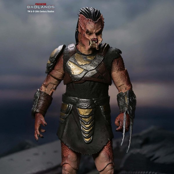 PREDATOR BADLANDS - ACTION FIGURE IN SCALA 7" - ULTIMATE DEK (ARMATURA DA ADDESTRAMENTO)