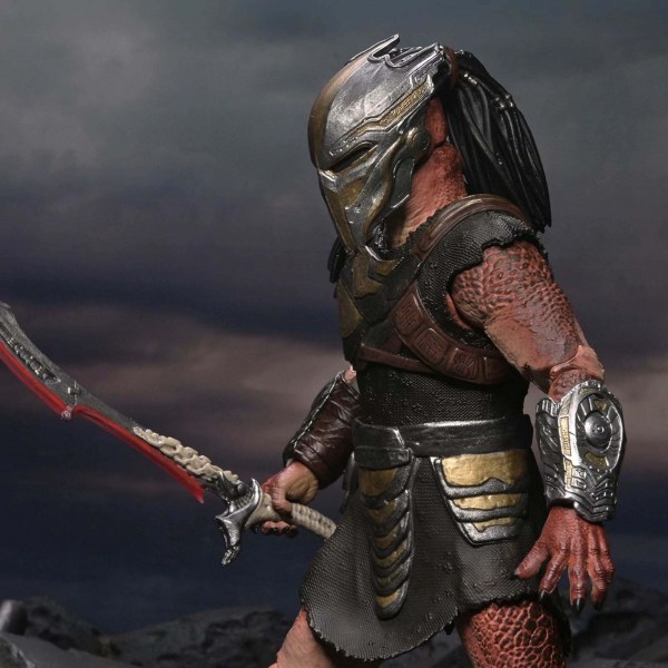PREDATOR BADLANDS - ACTION FIGURE IN SCALA 7" - ULTIMATE DEK (ARMATURA DA ADDESTRAMENTO)