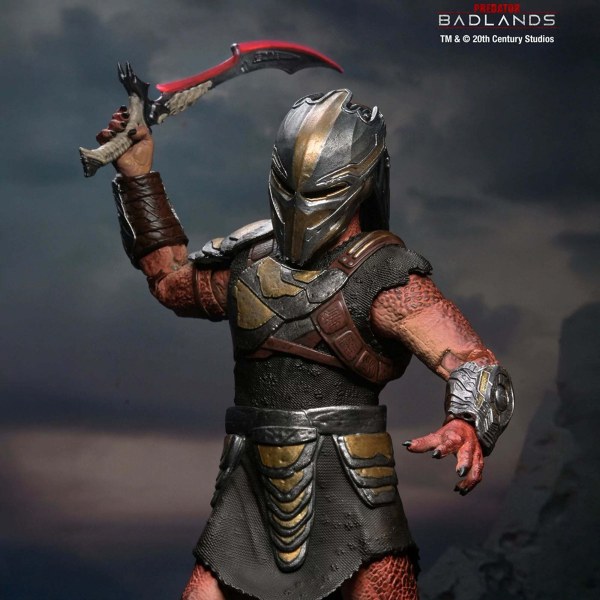 PREDATOR BADLANDS - ACTION FIGURE IN SCALA 7" - ULTIMATE DEK (ARMATURA DA ADDESTRAMENTO)