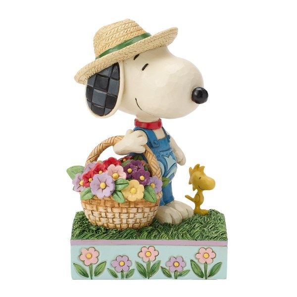 Snoopy con in mano un cestino di fiori - Peanuts